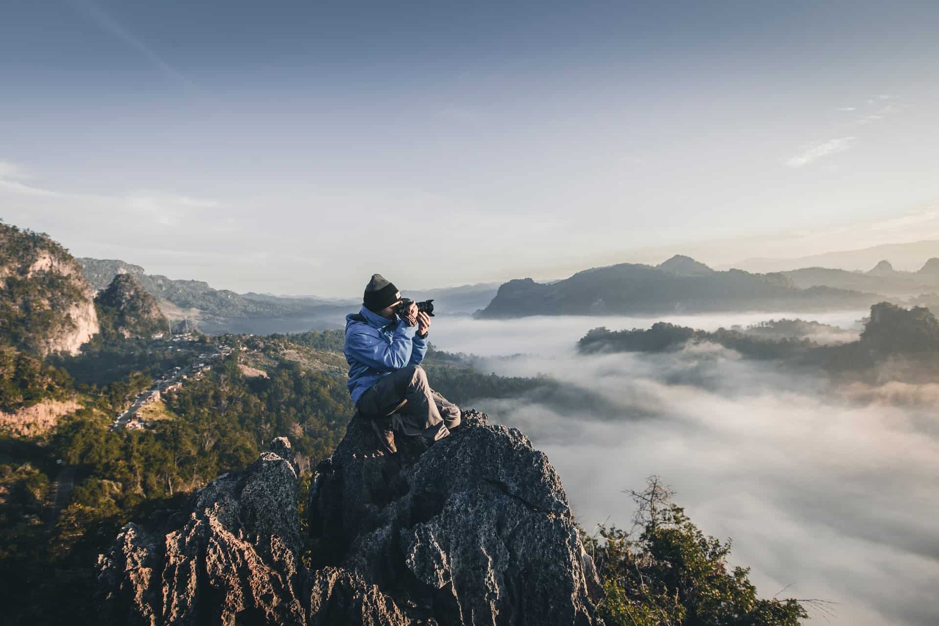 photographer on mountain top