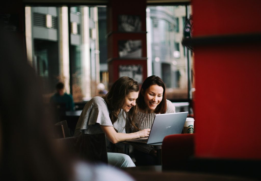 Two Women Looking at a Computer