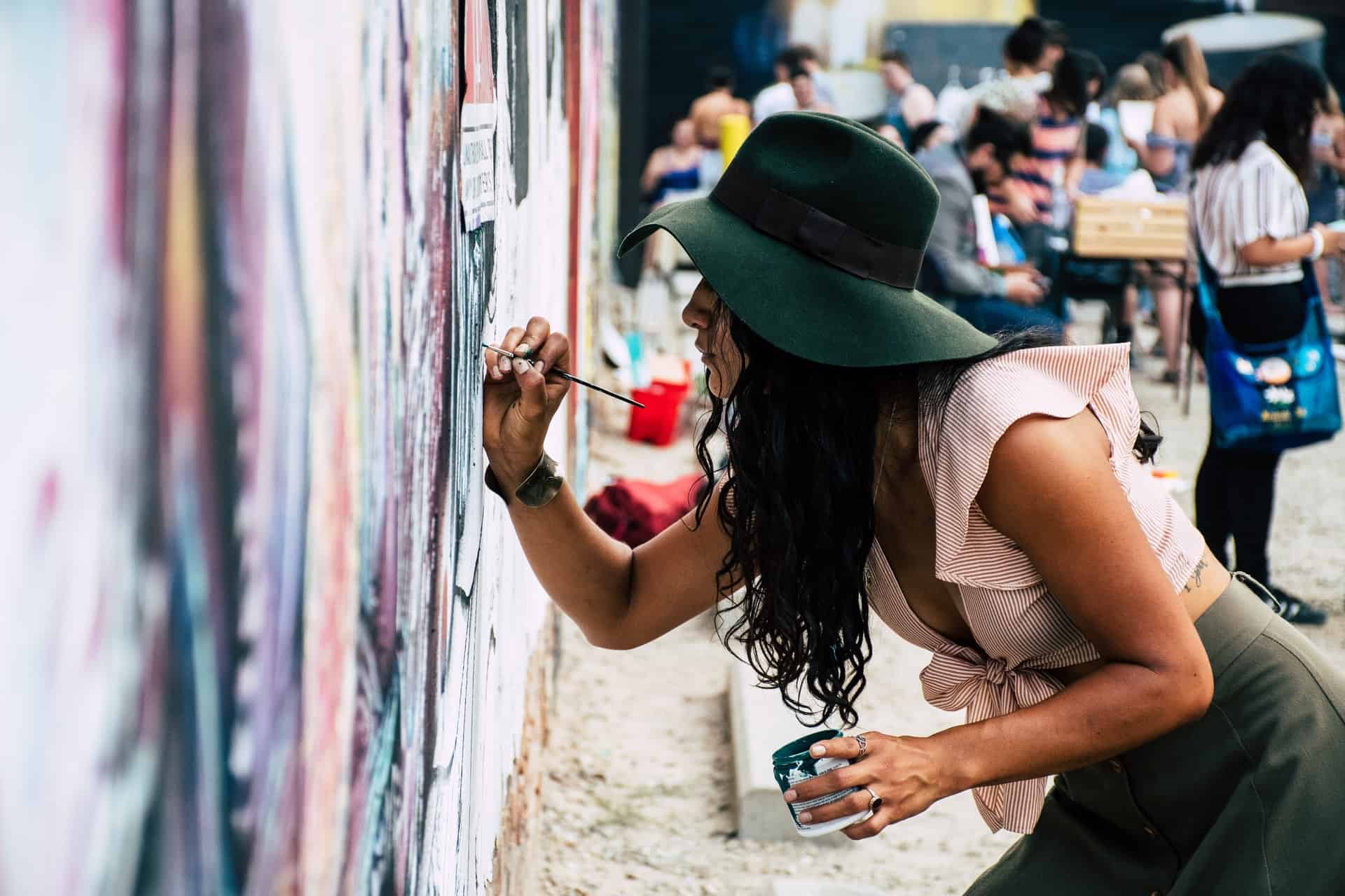 woman painting wall