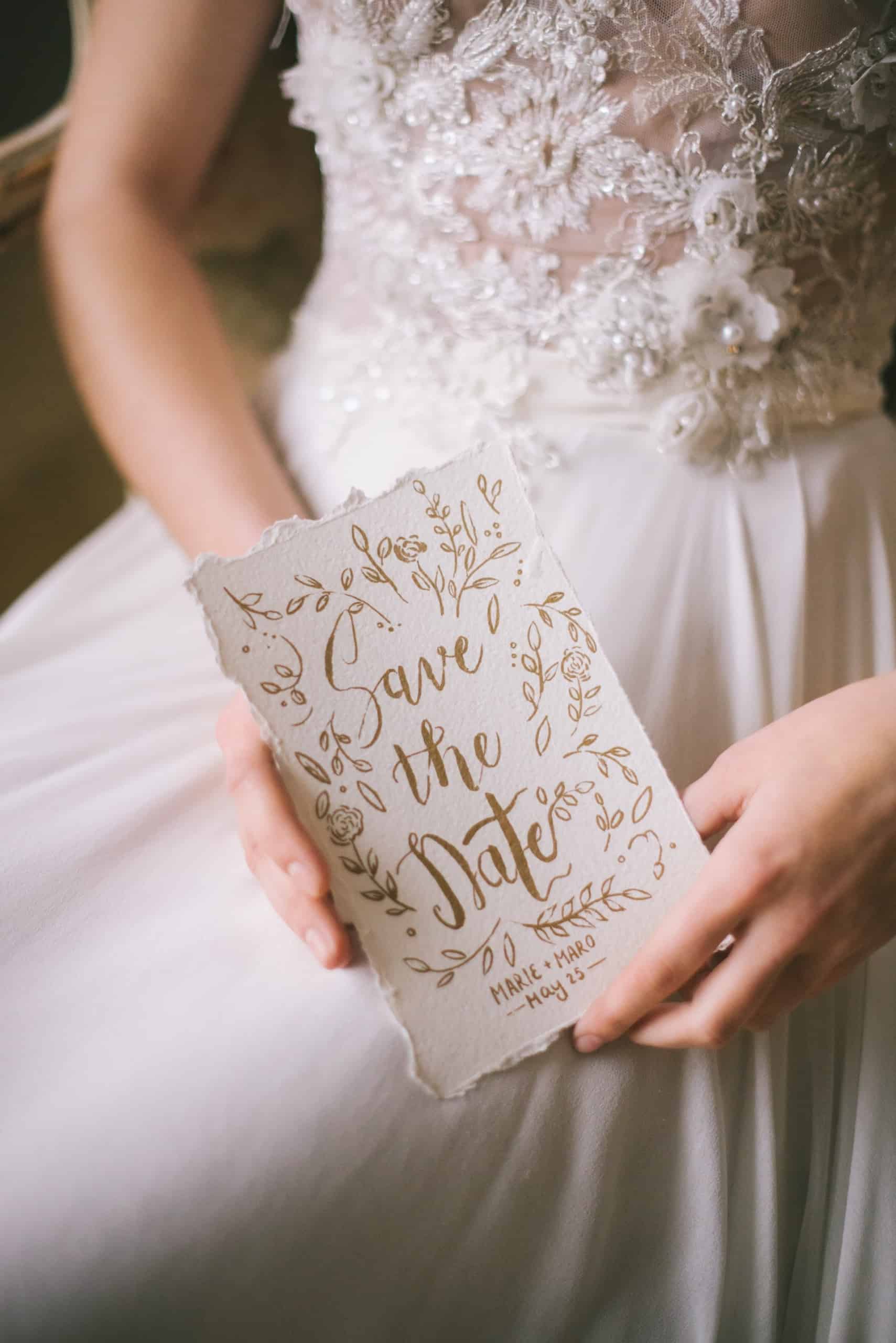 bride holding invitation