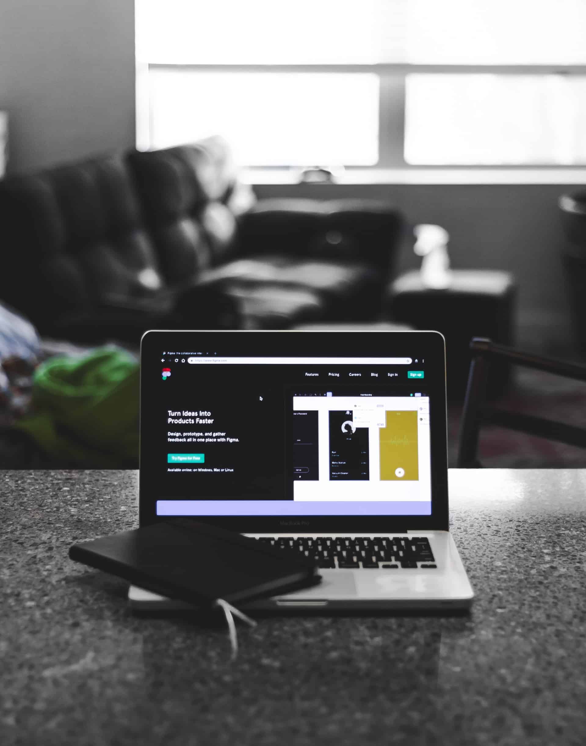smartphone next to laptop