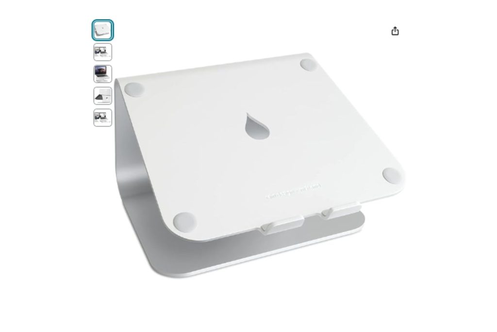 A silver colored laptop stand with a cut out raindrop in the center.