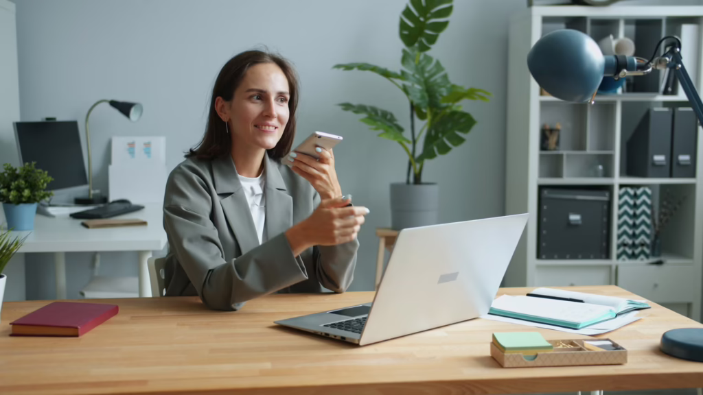 Woman wearing suit and speaking to phone