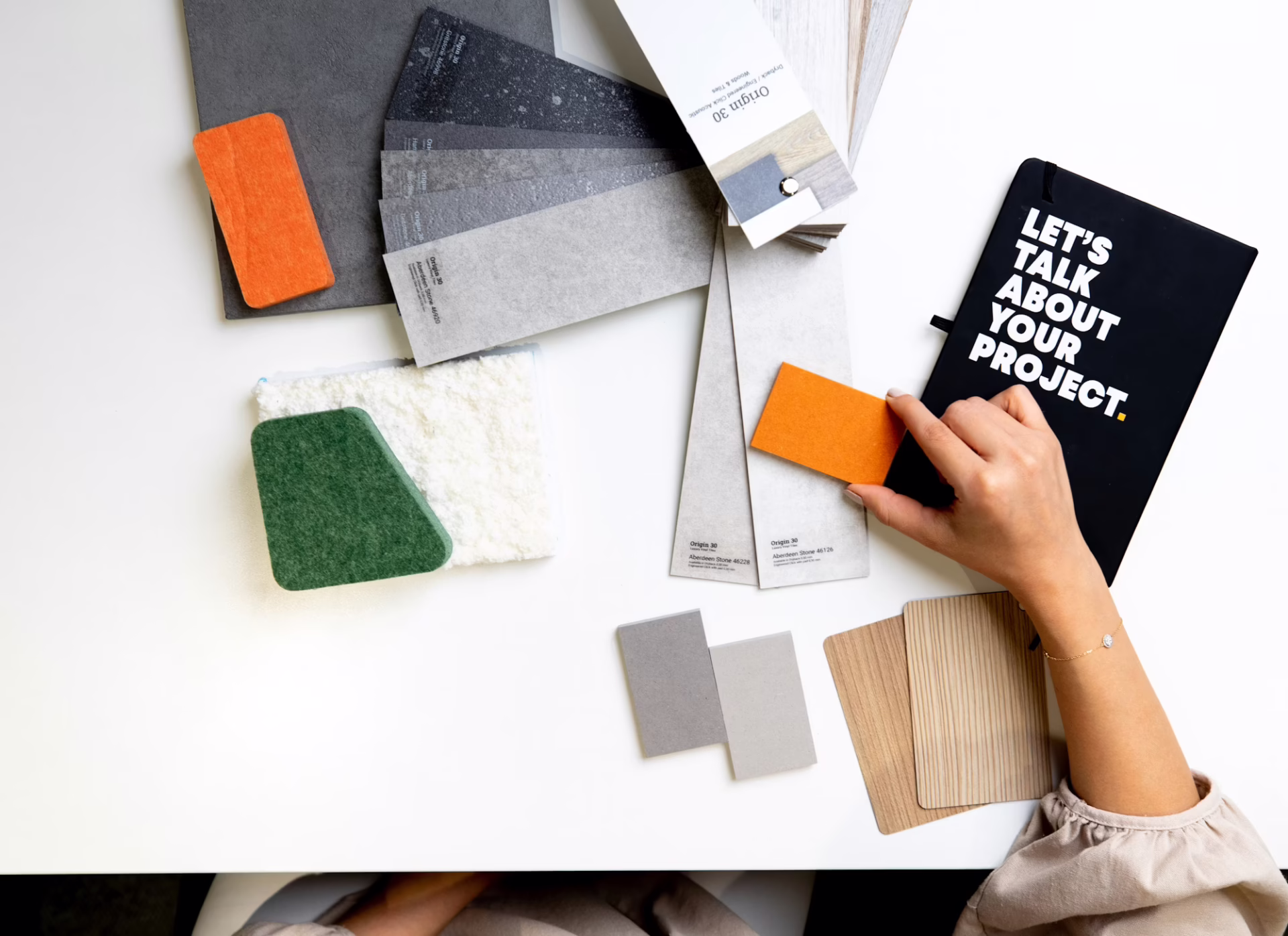 Design swatches laid out on table