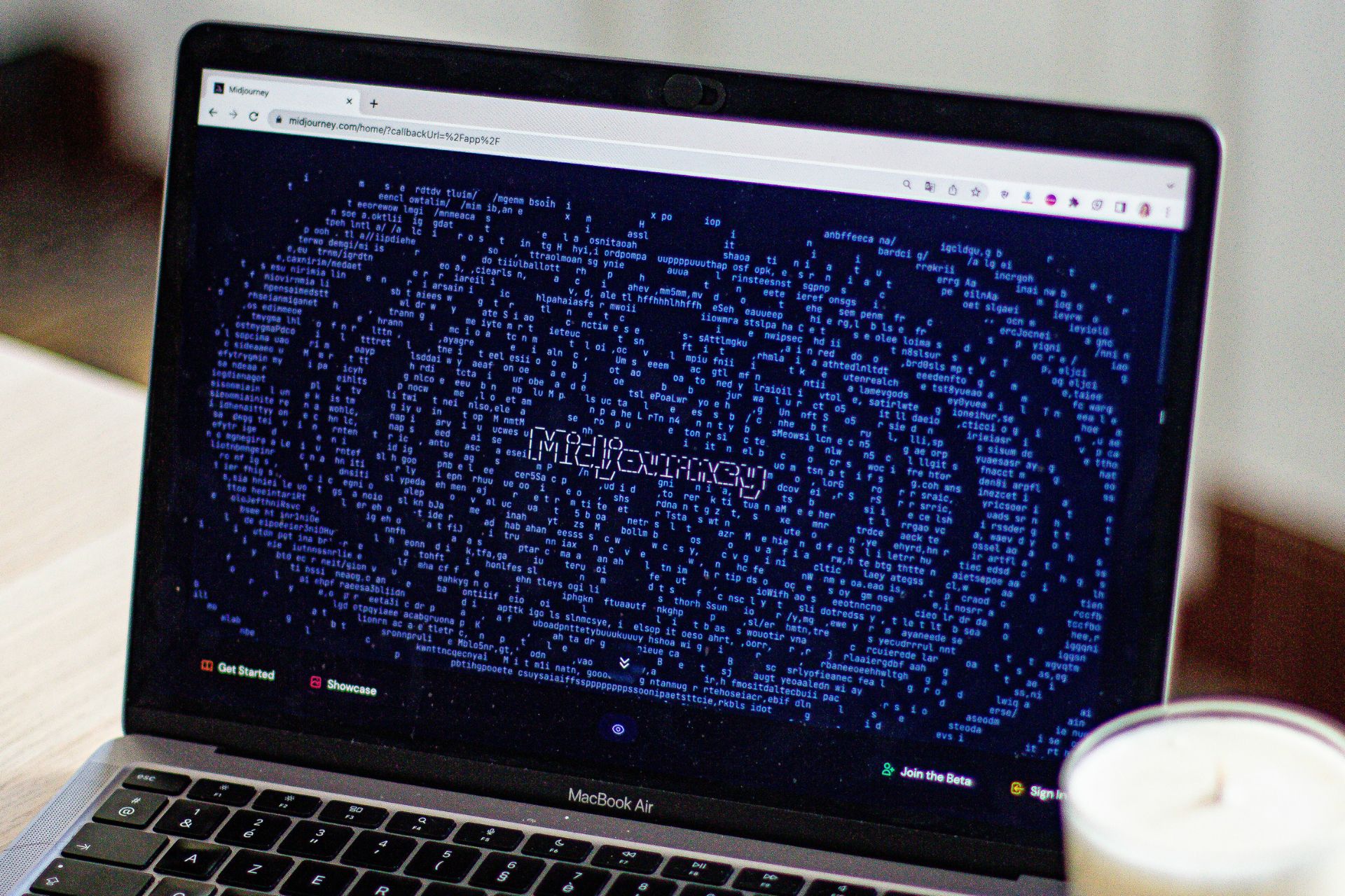 Laptop displaying Midjourney AI-generated logo interface with a blue abstract design on screen