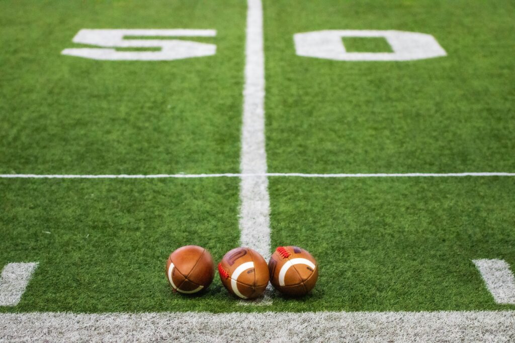Footballs on football field