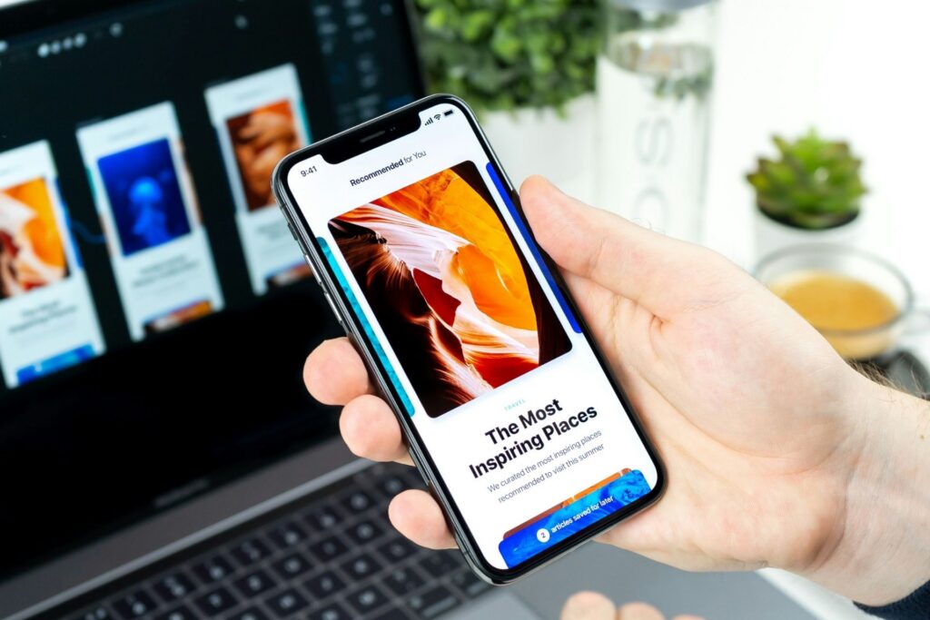 Person viewing a travel recommendation interface on a smartphone