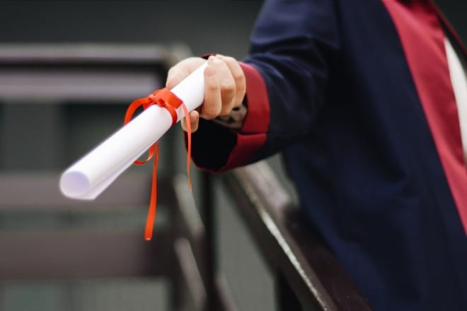 person holding degree