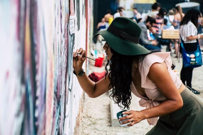 woman painting wall