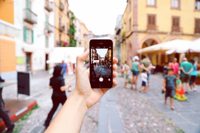 person taking picture with phone