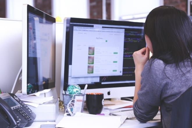 woman on desktop computer