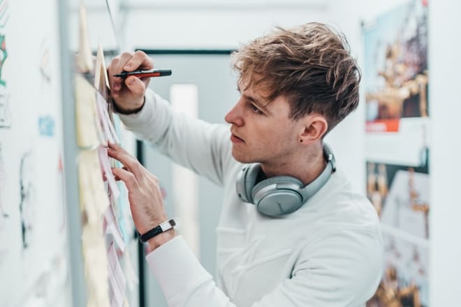 great designers advise writing on a board