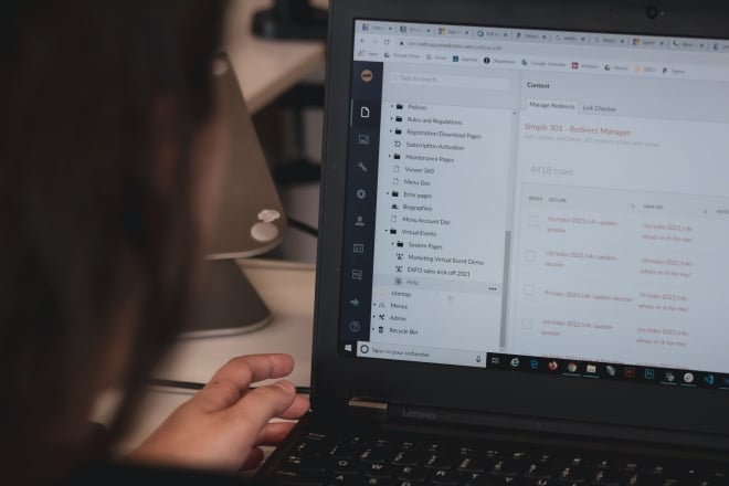 person working on black laptop computer