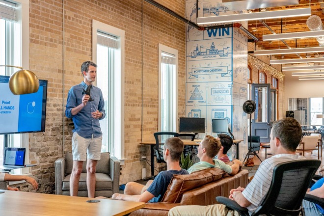 Man doing a presentation in front of colleagues
