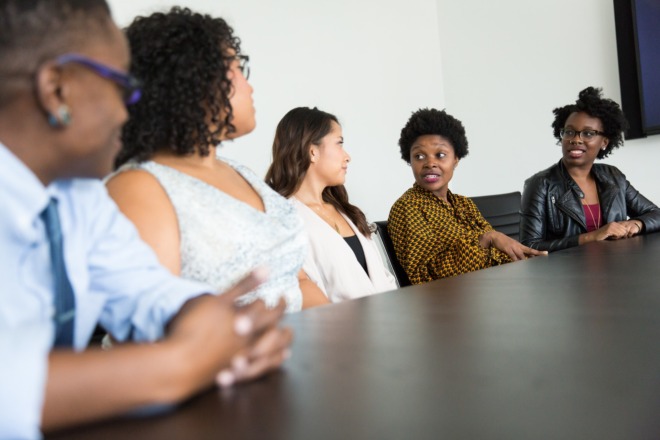 A group of employees practicing intercultural communication