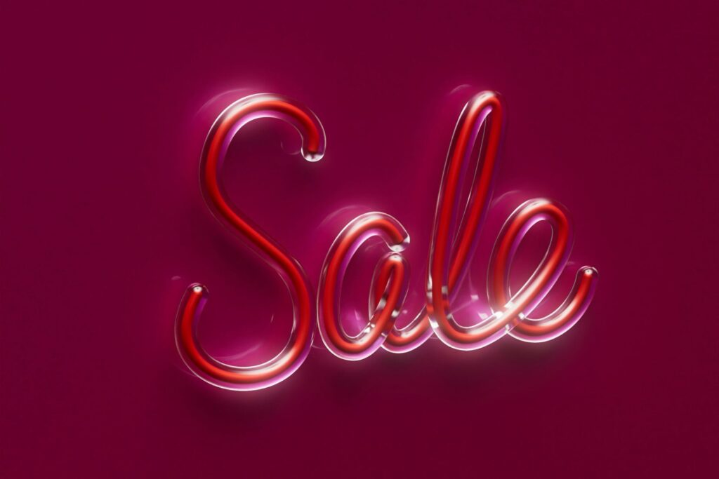 Neon sign displaying the word "Sale" prominently against a vibrant red background