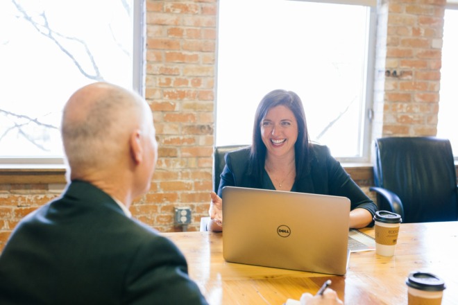 Business woman laughing with a man