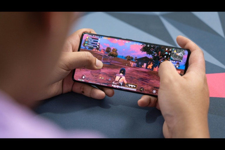 gamer using a cellphone