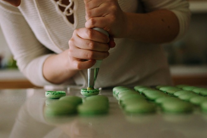 a solo entrepreneur making macarons