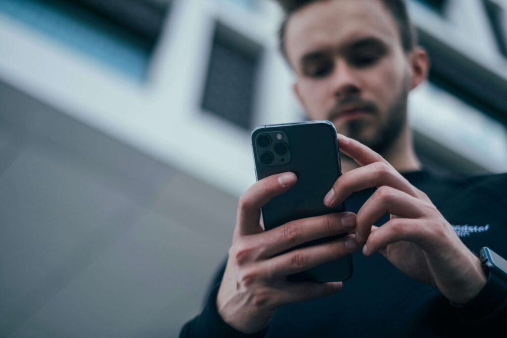 A man looking at his phone. 